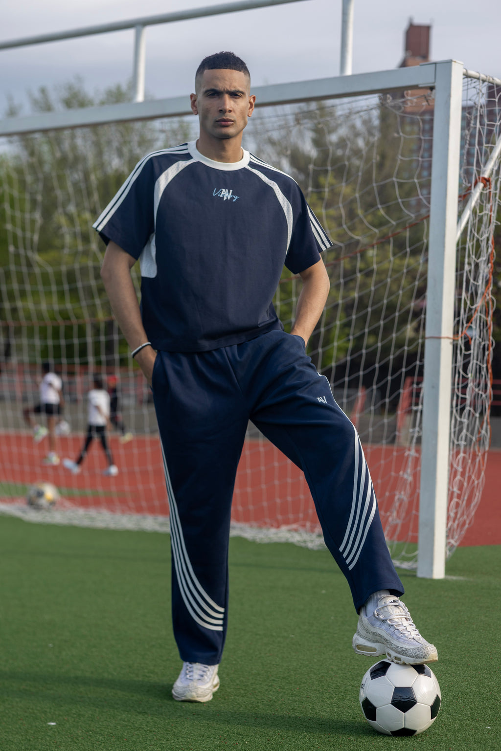Curved Stripe Straight Sweatpants