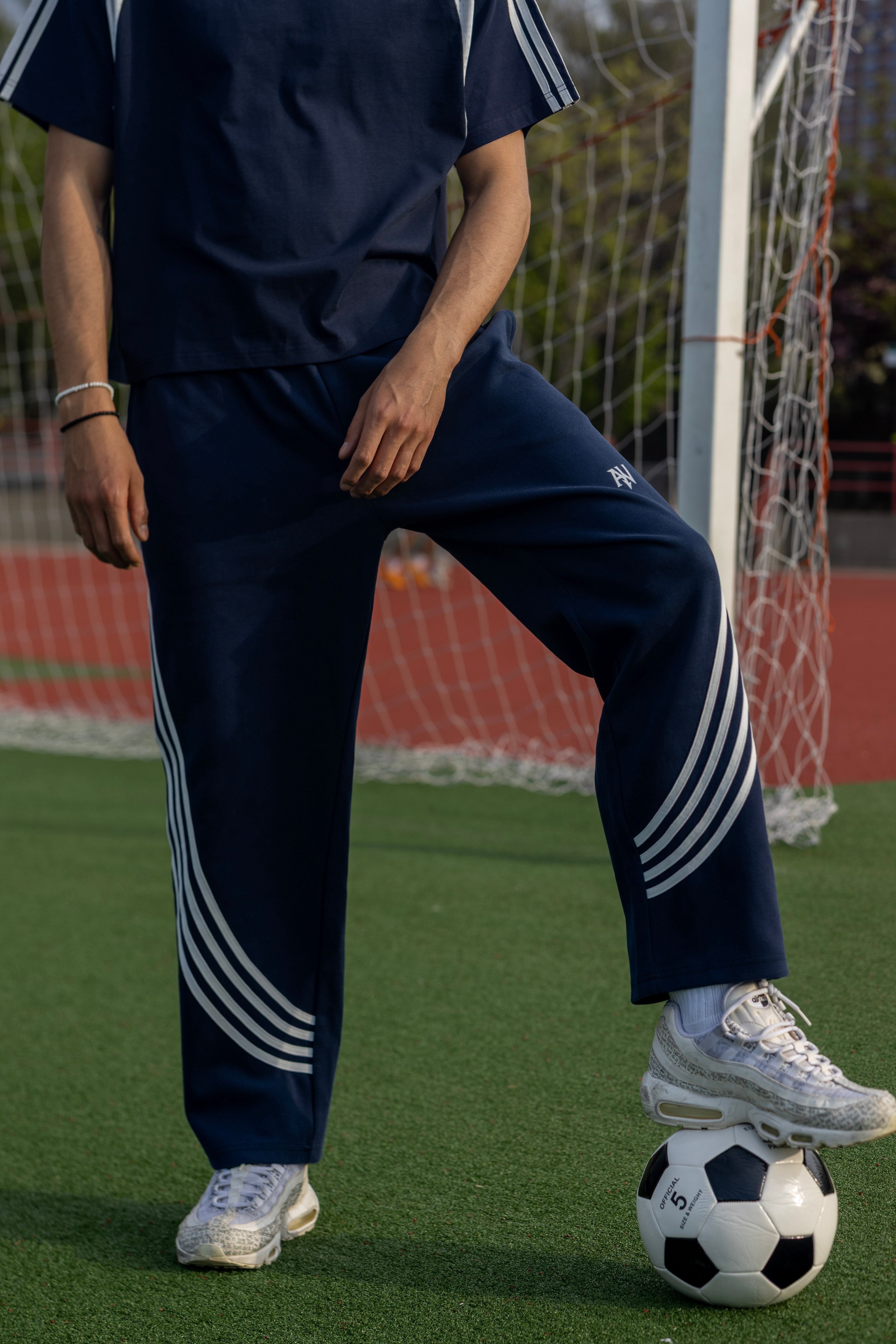 Curved Stripe Straight Sweatpants
