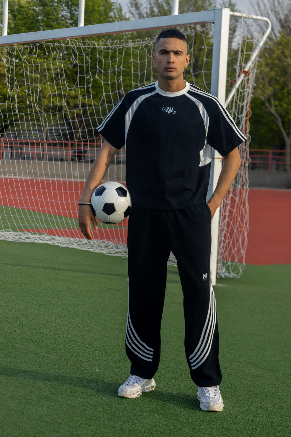 Curved Stripe Straight Sweatpants