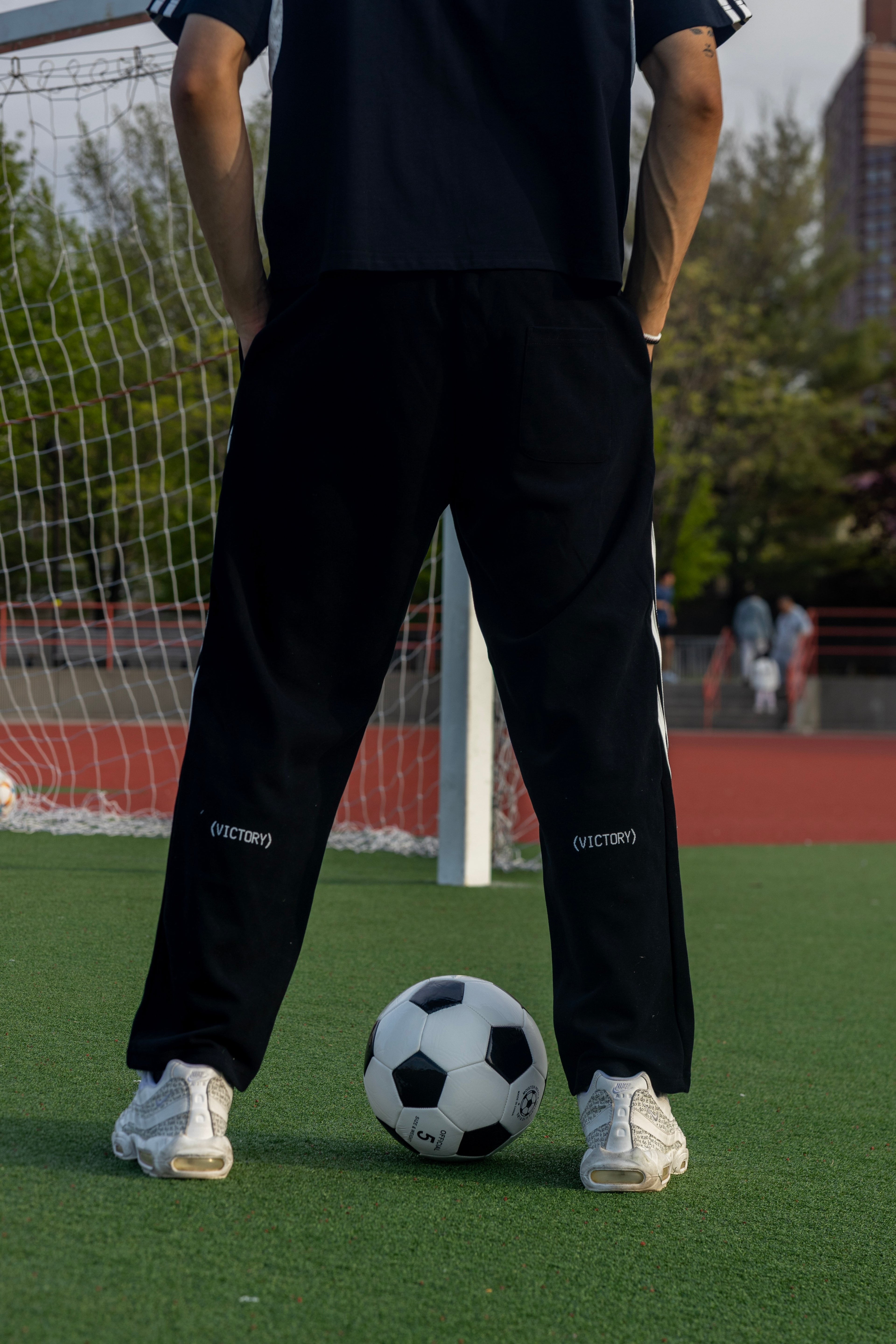 Curved Stripe Straight Sweatpants