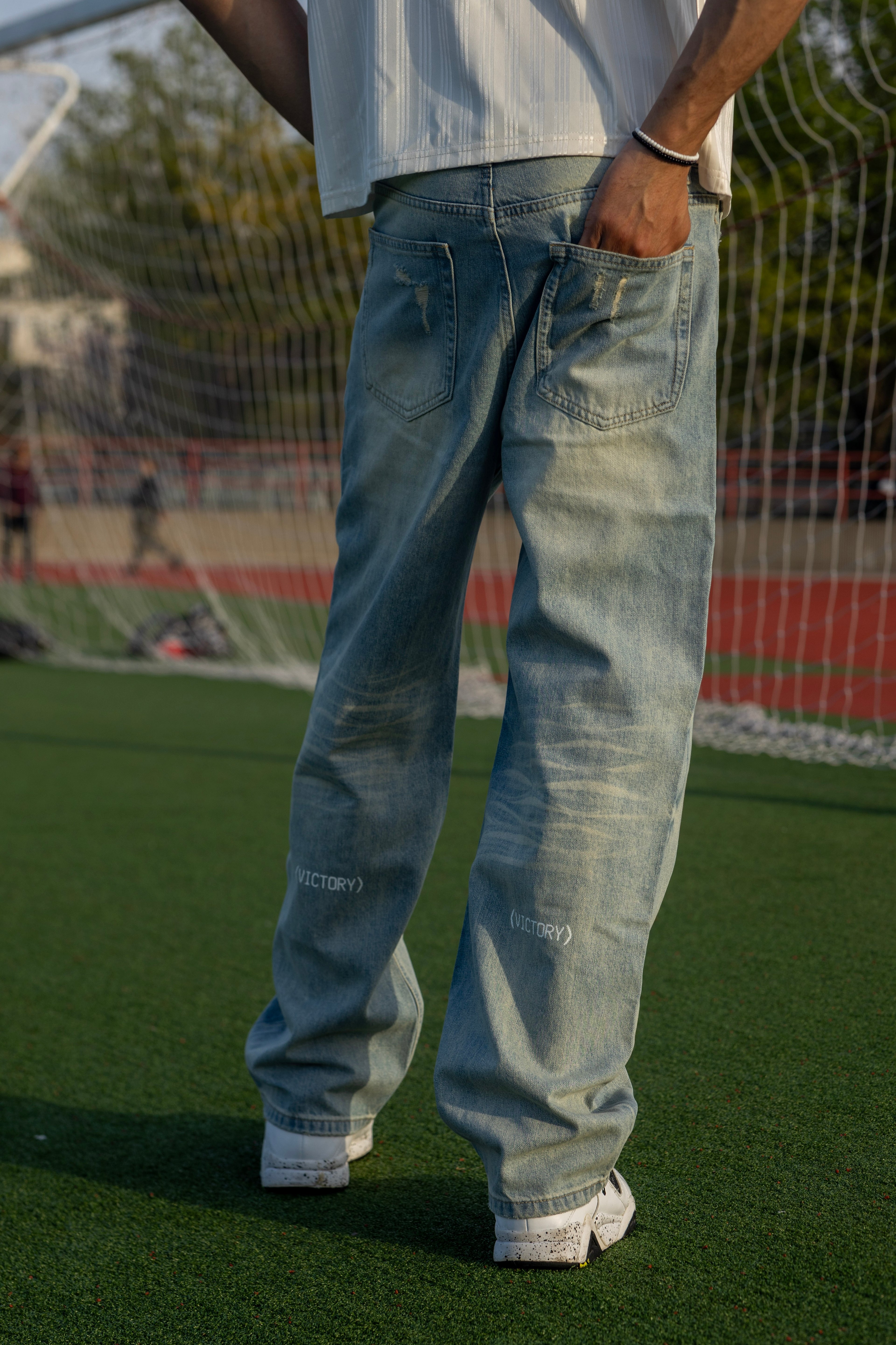 Sun Fade Raw Hem Denim Jeans